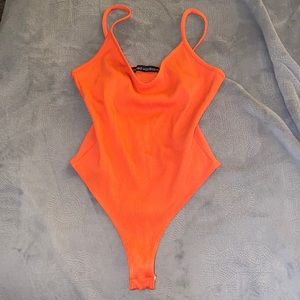 Naked Wardrobe ribbed body suit. Orange